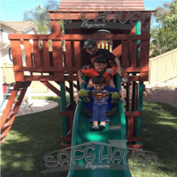 Safe Haven Daycare boys on slide
